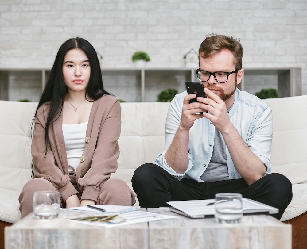 Couple showing disconnection and emotional distance.