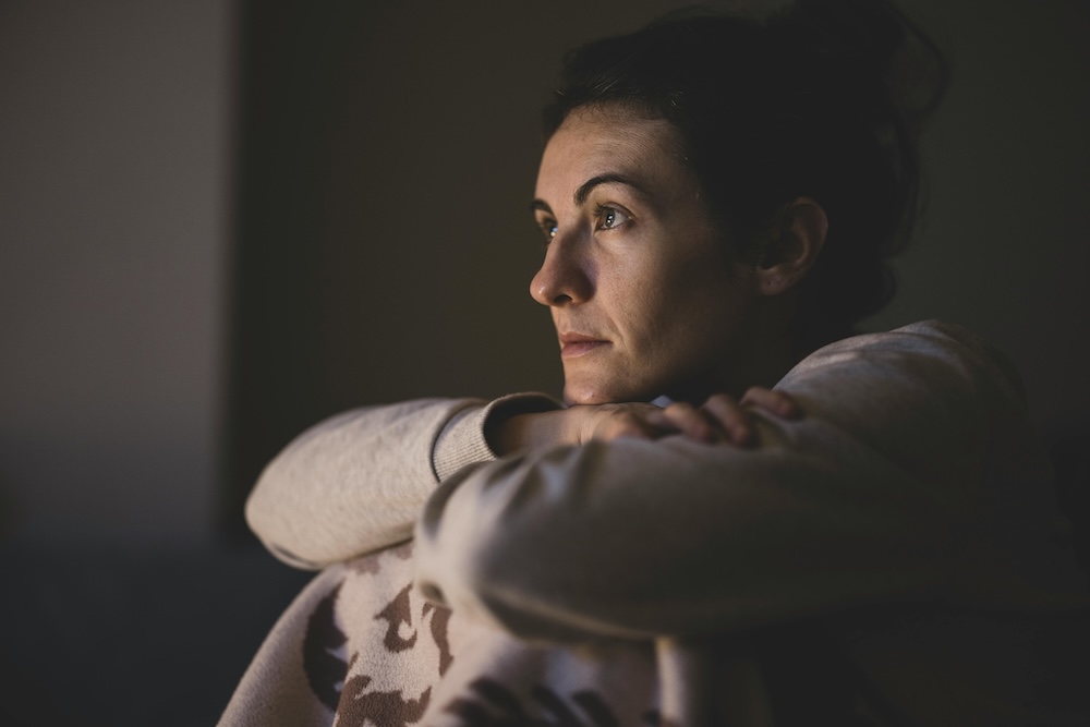 Betrayed partner processing emotional pain.