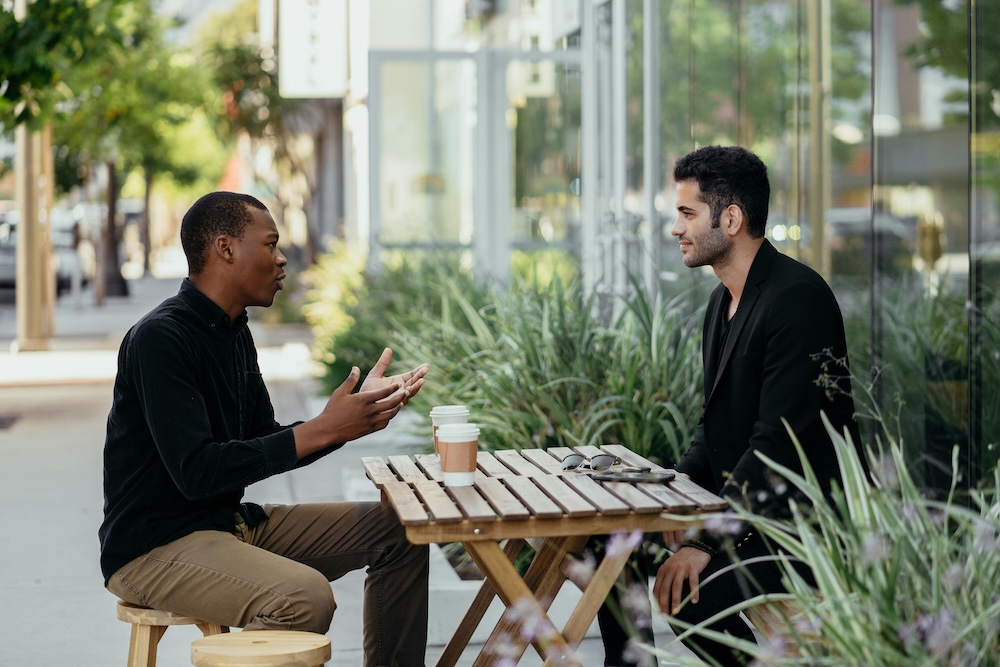 What recovery looks like alongside Covenant Eyes -- two people in a warm, quiet conversation