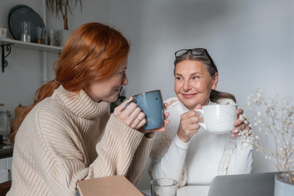 women supporting each other in recovery — two women having a warm conversation