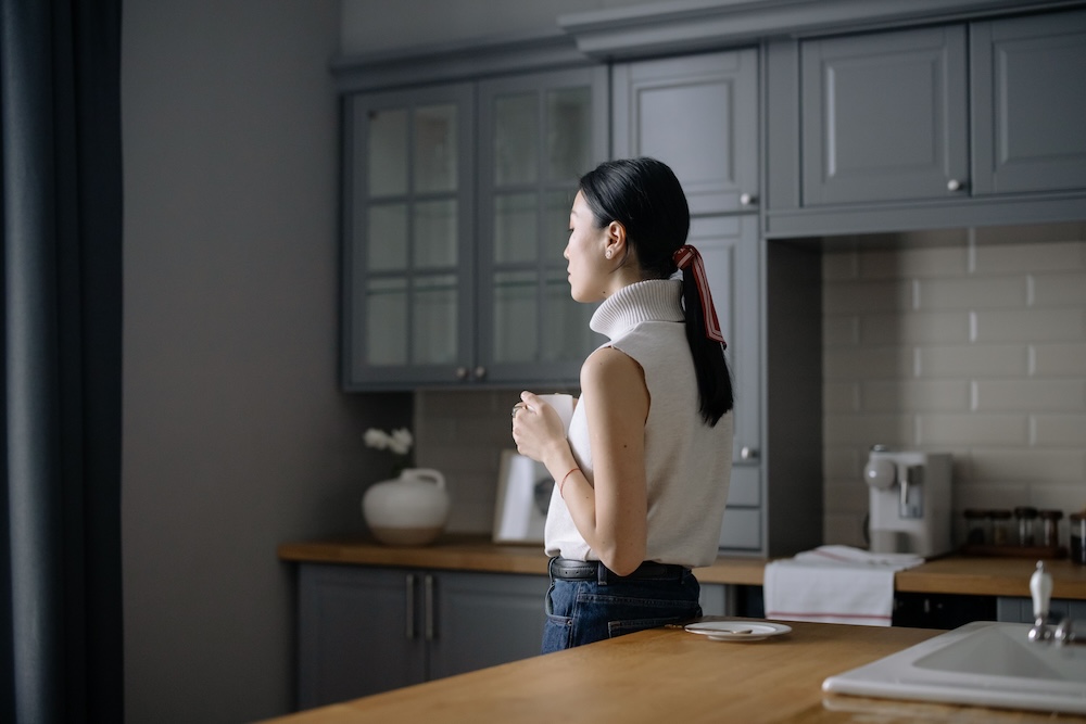 The body keeps its own timeline in betrayal trauma recovery — person quiet in morning light