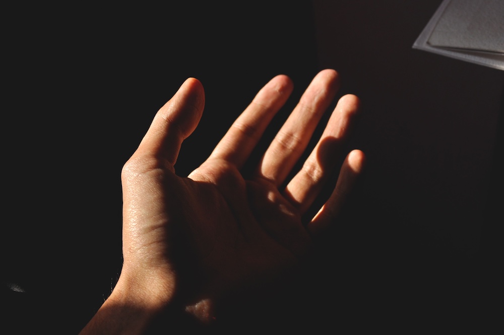 the kind of porn you use as a map -- a hand reaching toward light, suggesting an unmet longing
