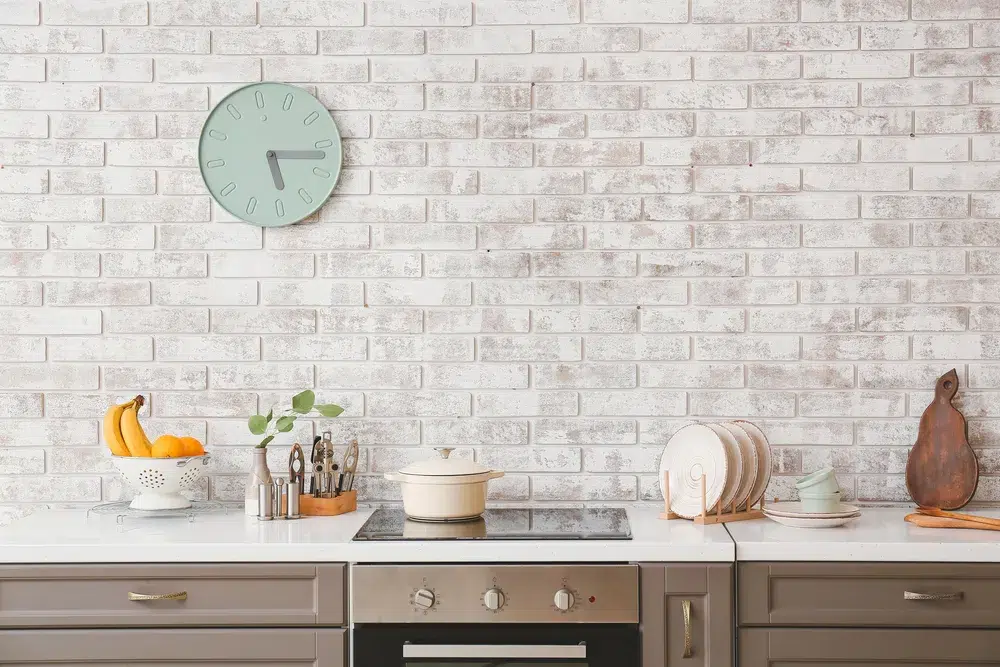 Wall clock in a bright kitchen, a reminder to name a return time and keep it